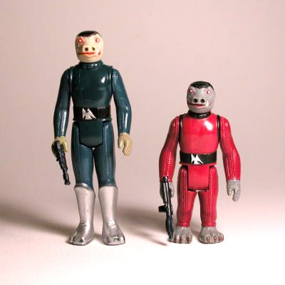 Blue and red Snaggletooth. Rare Star Wars action figures that could be in storage.